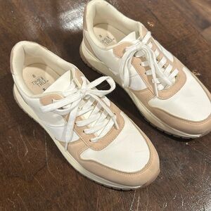 Nude and white tennis shoes